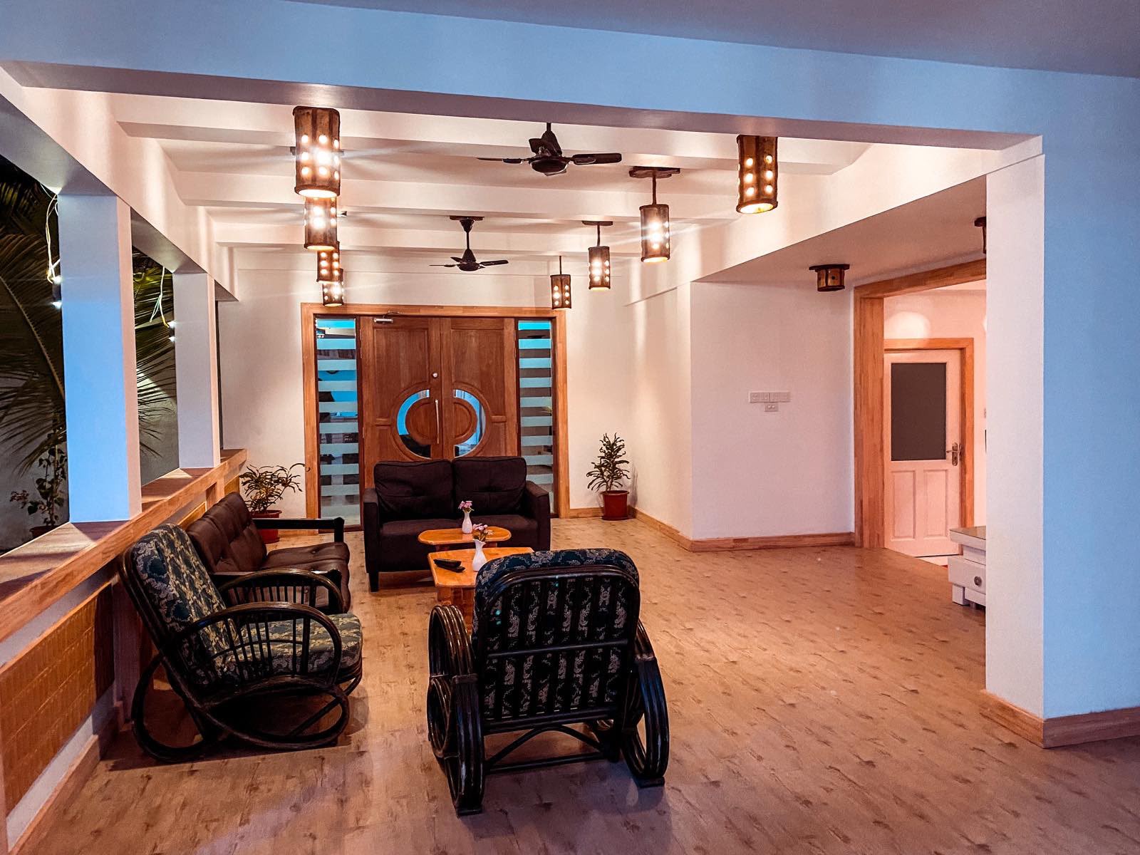 Main entrance with traditional wooden doors